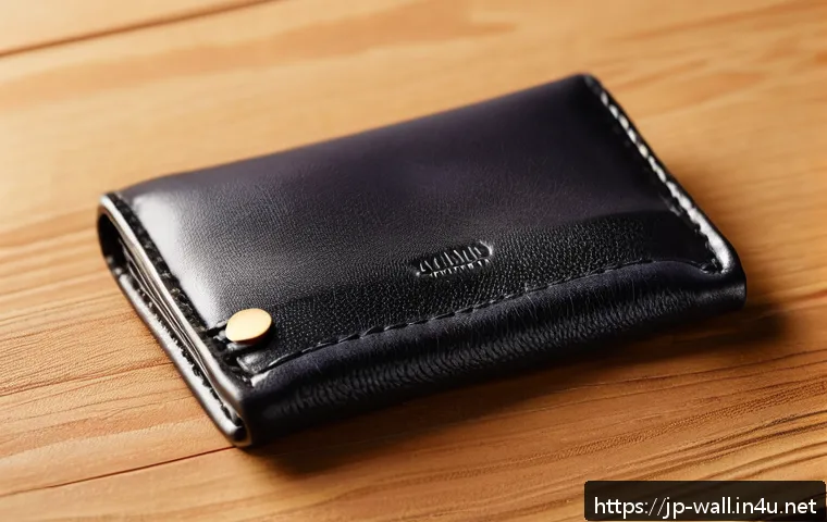 보테가 베네타 가죽 지갑 관리법 - A close-up of a high-quality leather wallet being gently wiped with a soft microfiber cloth, highlig...